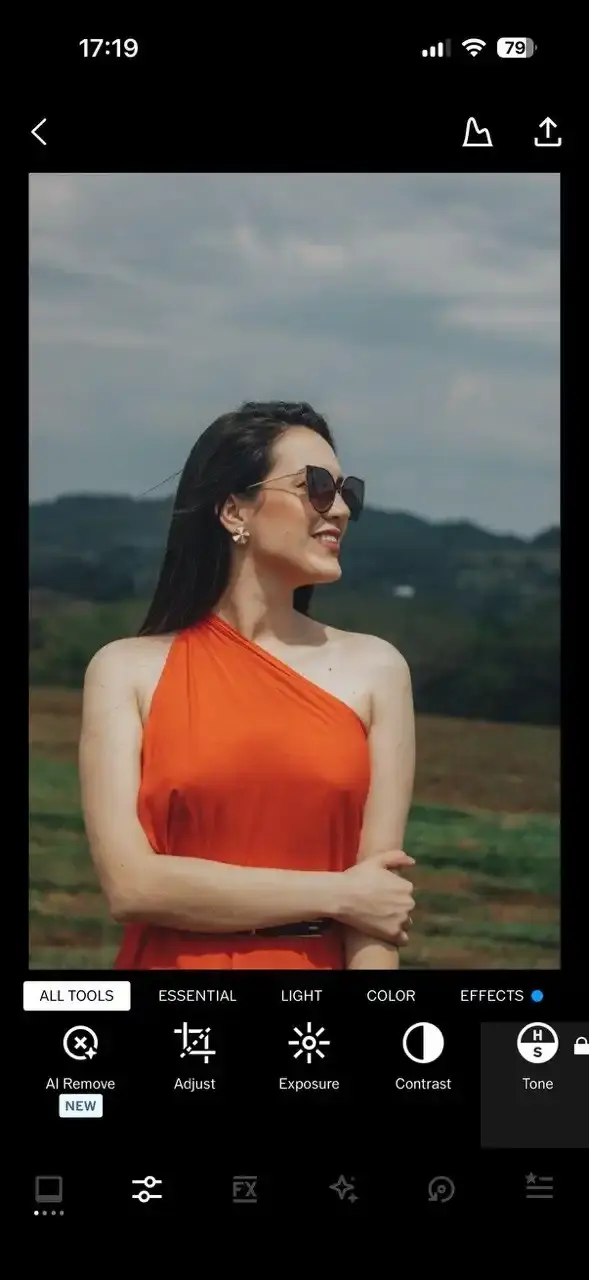 The editor in VSCO showing the Adjust, Exposure, Contrast and Tone tools