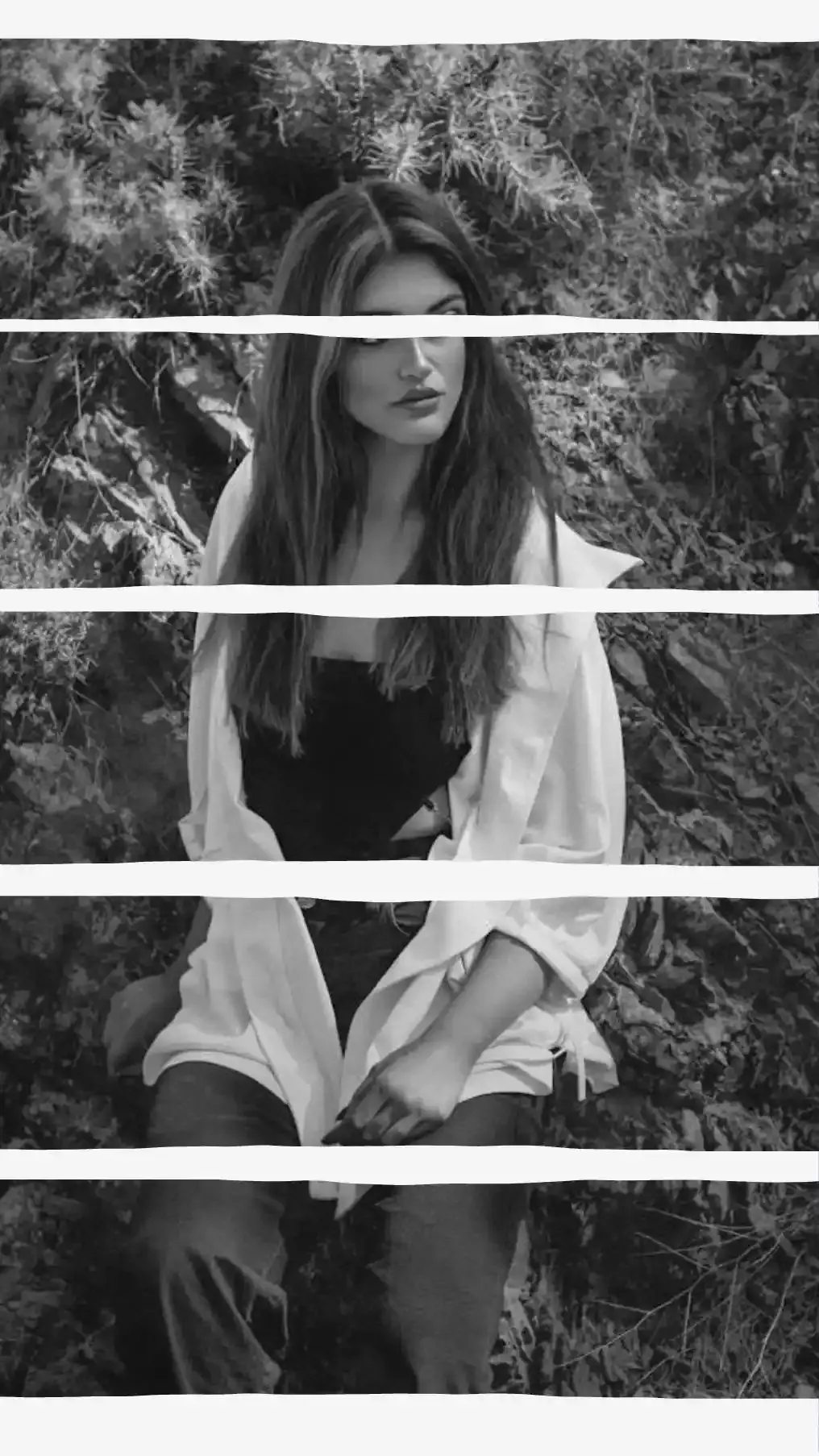 Black and white portrait collage with torn paper strips and artistic editorial style